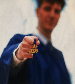 Christopher in graduation gown